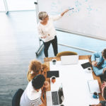 Shot of a group of young businesspeople having a meeting in a modern office